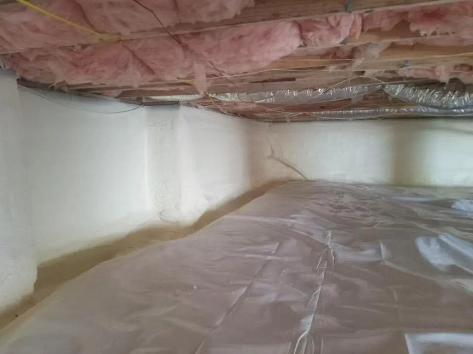 Crawl space encapsulation with closed-cell spray foam for Commercial Roof Restoration in East Rutherford